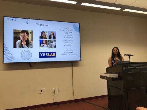 Maddy presenting her work on social expectation and guilt.